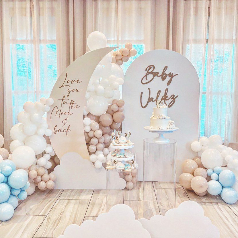 Baby Valdez moon and arch backdrops with neutral balloons